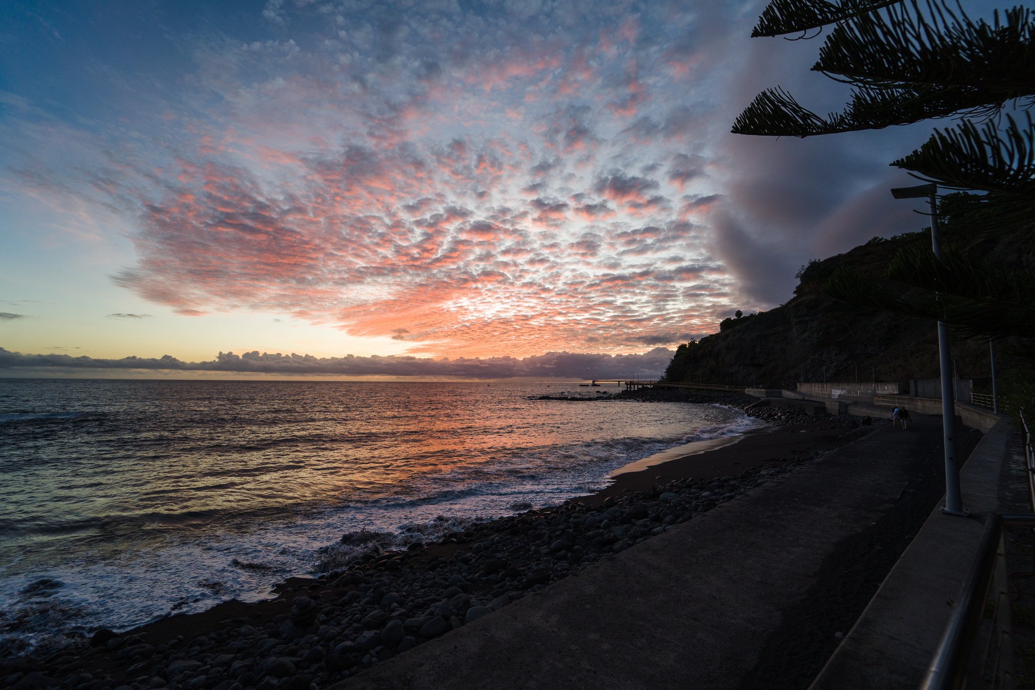 Radiant Sunset: A Captivating Moment on a Madeira Beach