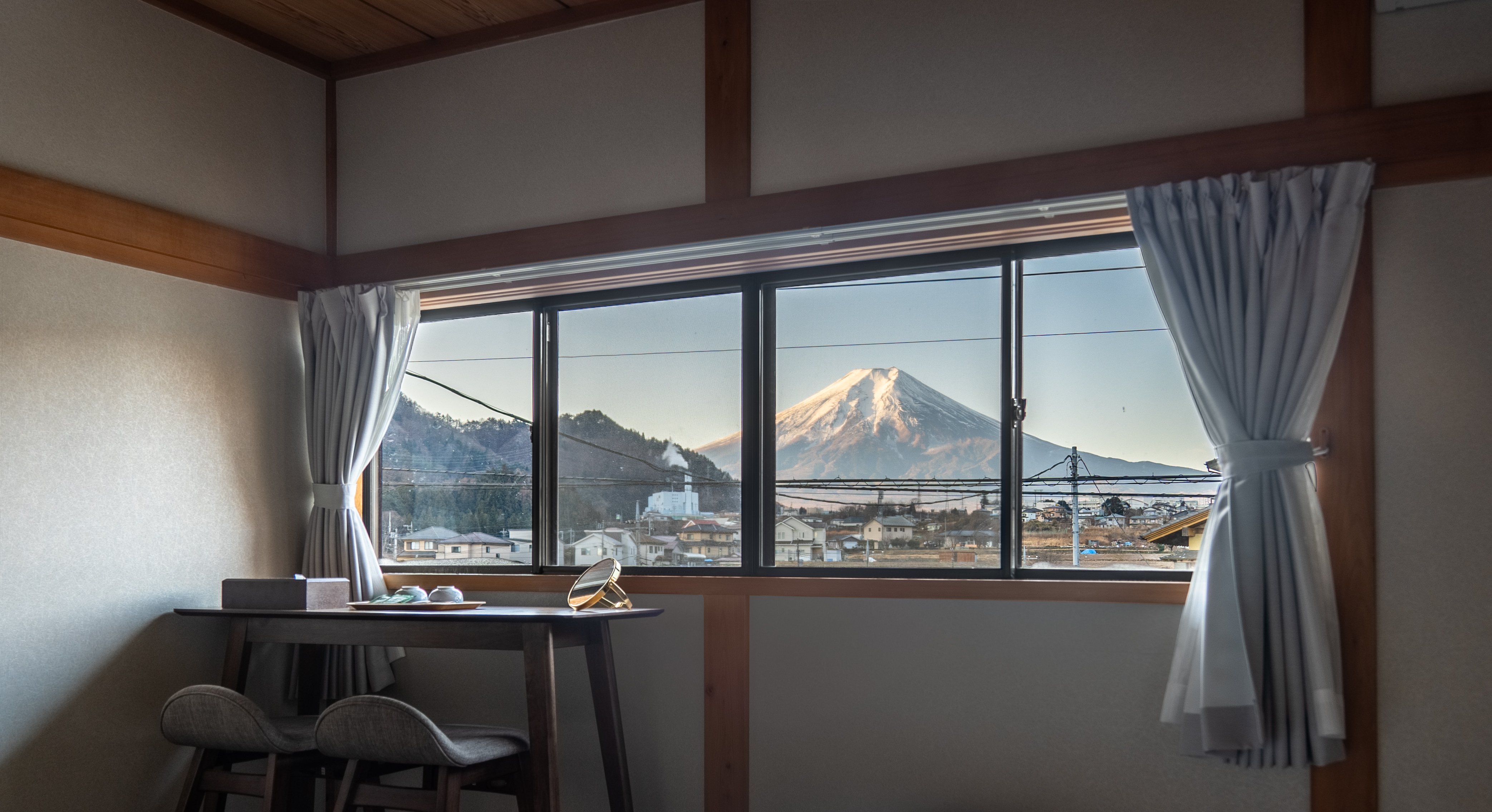 picturesque view of mountain outside of hotel window