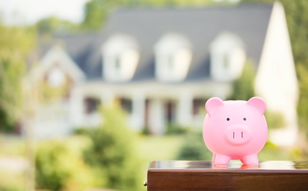 piggy bank in front of airbnb